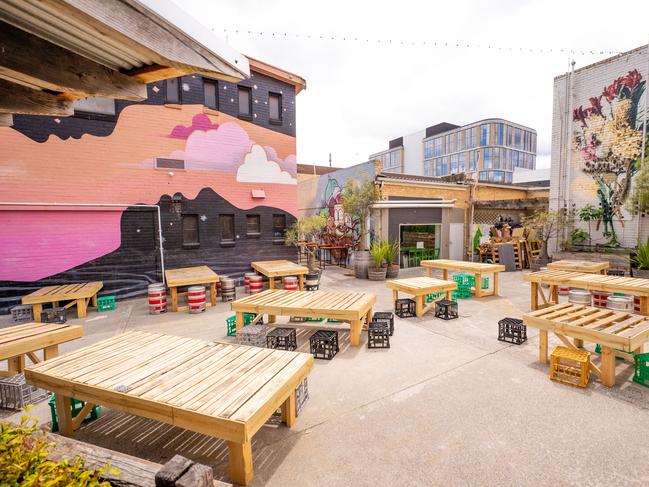 The walls of the courtyard venue and lined with street art. Picture: Supplied