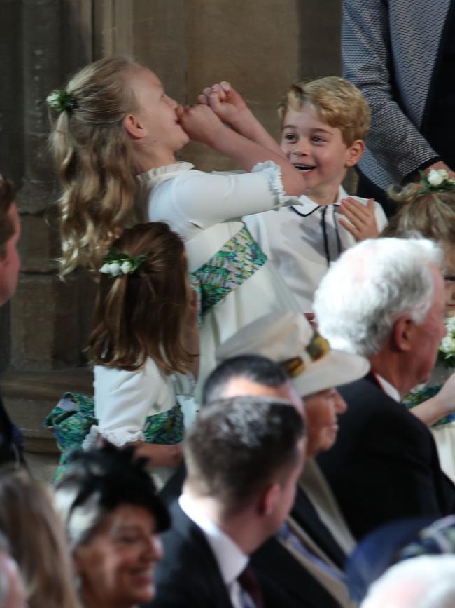 Prince George was making everyone giggle. Picture: Getty