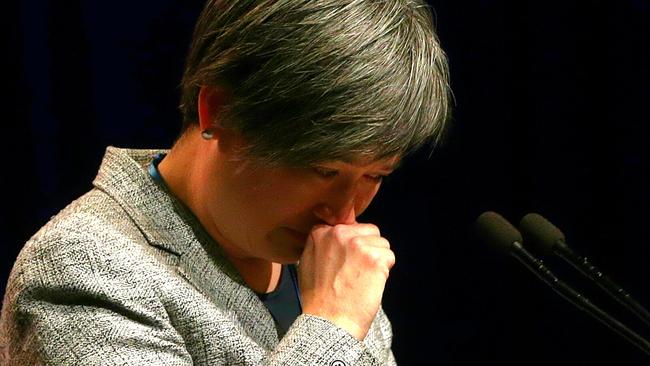 Penny Wong receives a standing ovation, chokes back tears as she addresses the crowd.