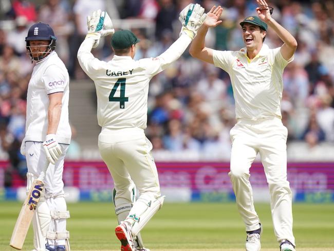 Australia's Alex Carey (centre) celebrates the run out of England's Jonny Bairstow (left) with Pat Cummins during day five of the second Ashes test match at Lord's, London. Picture date: Sunday July 2, 2023. (Photo by Adam Davy/PA Images via Getty Images)