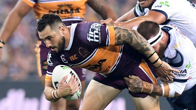 BRISBANE, AUSTRALIA - MARCH 22: Jack Bird of the Broncos attempts to break through the defence during the round two NRL match between the Brisbane Broncos and the North Queensland Cowboys at Suncorp Stadium on March 22, 2019 in Brisbane, Australia. (Photo by Bradley Kanaris/Getty Images)