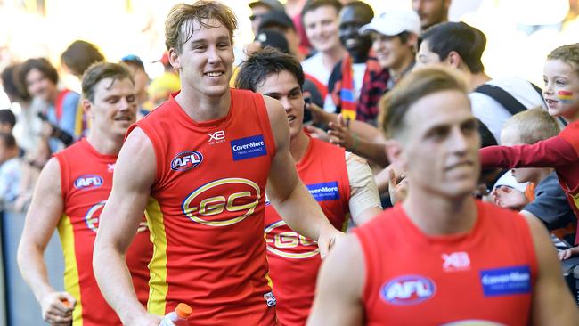 Tom Lynch celebrates Gold Coast’s win over Carlton.