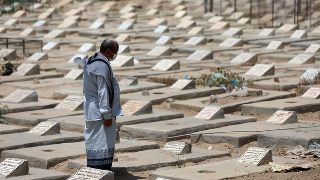 A man visits a plot allocated to coronavirus victims, at a cemetery in Yemen's third city of Taez. Picture: AFP