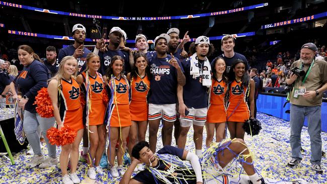 The Auburn Tigers celebrate after defeating the Florida Gators in the SEC Tournament Championship game. Photo by Andy Lyons/Getty Images.