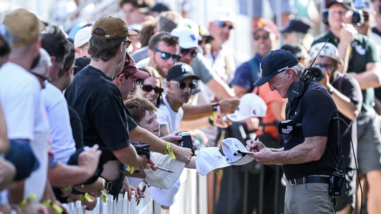 Greg Norman signs autographs in Adelaide, Australia. (Photo by Mark Brake/Getty Images)