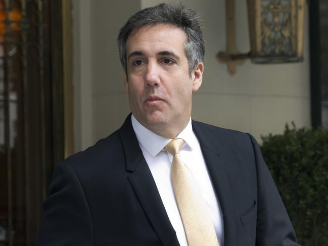 Michael Cohen, former personal lawyer to President Donald Trump, leaves his apartment building, in New York, Tuesday, Aug. 21, 2018.  (AP Photo/Richard Drew)