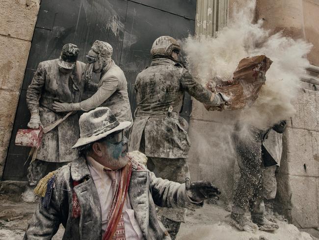 People - Second Prize, Stories Picture: Antonio Gibotta, Agenzia Controluce Title: Enfarinat Story: On 28 December each year, the “Floured War” takes place in Ibi in the province of Alicante, Spain. During the festival, the citizens are divided into two groups: the ‘Enfarinat’ (the floured) group simulates a coup d’etat and a second group tries to calm the rebellion. The teams play with flour, water, eggs and colored smoke bombs. The 200-year-old tradition is known as “Els Enfarinats”, marking the biblical Massacre of the Innocents by King Herod.