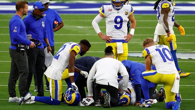 Odell Beckham Jr. lies on the ground after an injury. Photo by Ronald Martinez/Getty Images.