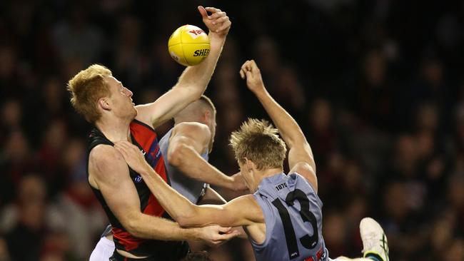 Essendon defender Aaron Francis tries to pull down a one-handed mark. Picture: Michael Klein