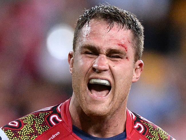 BRISBANE, AUSTRALIA - MAY 30: James Horwill of the Reds celebrates victory after team mate Jake Schatz scores after the siren to win the match after the round 16 Super Rugby match between the Reds and the Highlanders at Suncorp Stadium on May 30, 2014 in Brisbane, Australia. (Photo by Bradley Kanaris/Getty Images)