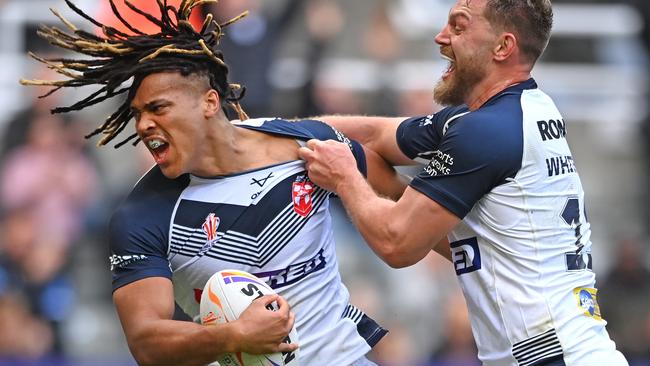 England player Dominic Young (l) celebrates with Elliott Whitehead after scoring the second try during Rugby League World Cup 2021 Pool A match between England and Samoa at St. James Park on October 15, 2022 in Newcastle upon Tyne, England. (Photo by Stu Forster/Getty Images)