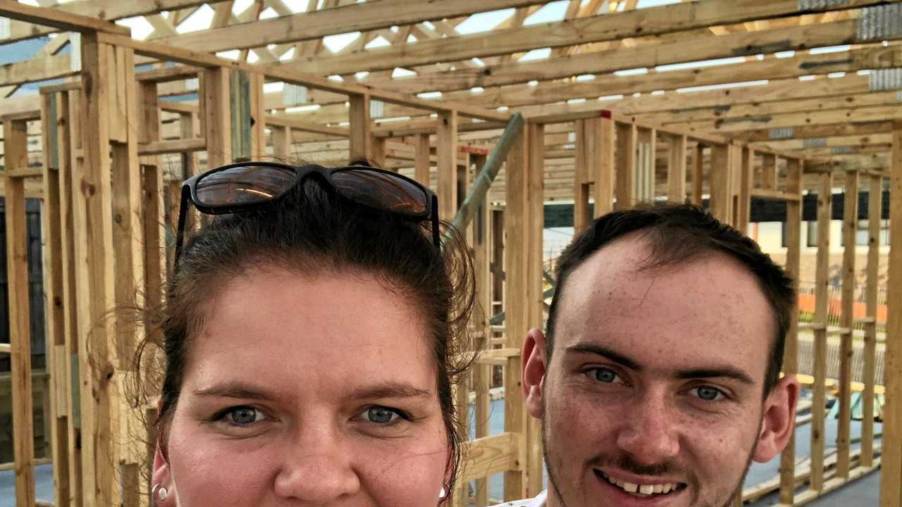 DREAMS: Josh Wardell with partner Samara Thompson on the block of land where their house is currently under construction