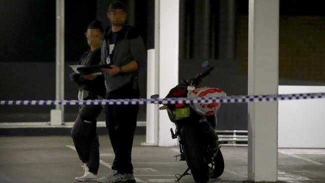 A motorcycle at the crime scene. Picture: Toby Zerna