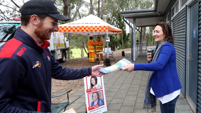 Georgina Downer handing out how to vote cards at the Bridgewater Primary School on election day. Picture: Kelly Barnes/AAP Image