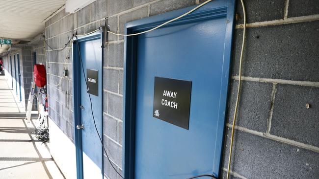 Wires hang across doorways. Picture: Richard Dobson