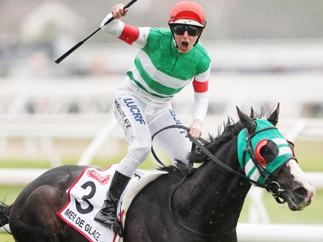 Jockey Damian Lane rides Mer De Glace to victory the Caulfield Cup.