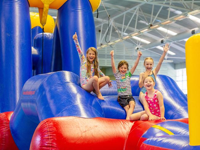 Kids are ready for fun on a giant obstacle course at Hobart Aquatic Centre. Picture: Linda Higginson