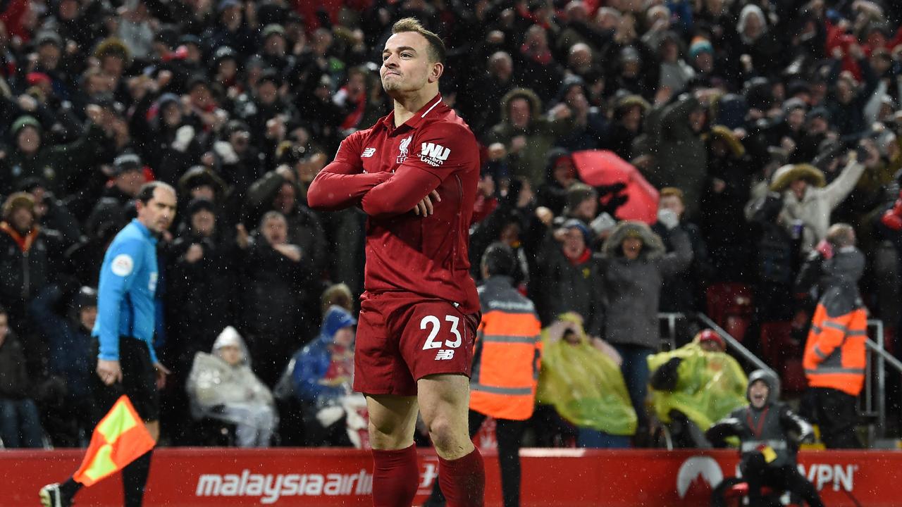 Liverpool's Swiss midfielder Xherdan Shaqiri celebrates