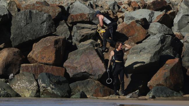 Police dive crews search for clues near the scene of Mr Kerr’s death at Noosa Heads on Sunday morning. Picture: Lachie Millard