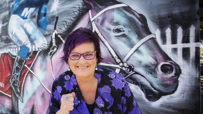 Winx co-owner Debbie Kepitis at the mural of Winx in Ascot Vale.