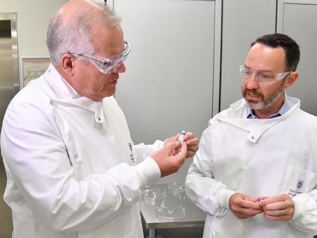 Prime Minister Scott Morrison with Professor Trent Munro during a tour of the University of Queensland Vaccine Lab in Brisbane. Picture: AAP Image/Darren England via NCA NewsWire