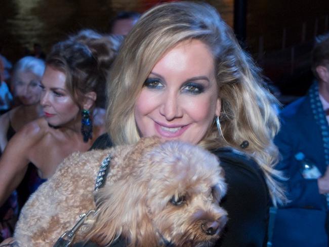 Barrister Gina Edwards and Oscar the cavoodle. Ms Edwards has launched defamation proceedings against A Current Affair over their reporting of a custody dispute involving Oscar. Picture: Supplied