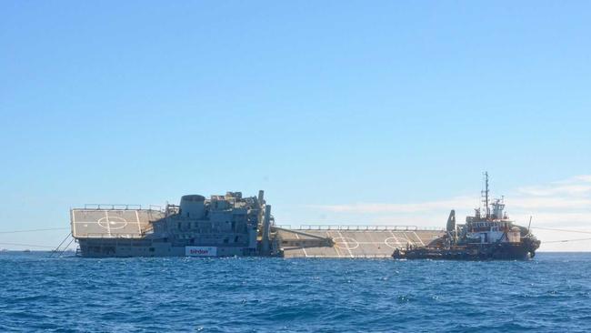 THAR SHE GOES: Ex-HMAS Tobruk is scuttled off the coast of Bundaberg on Friday, June 29. Picture: Craig Warhurst