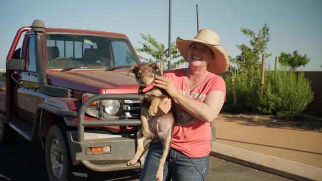 Joni Hall, 40, with puppy Chet in Muster Dogs, a show that proves the ABC can showcase the rich tapestry of Australian rural life to metropolitan viewers and overseas audiences.