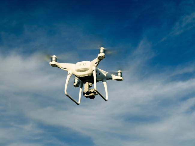 drone in blue sky flying