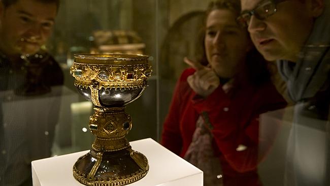 The real thing?... Visitors look at the goblet of the Infanta Dona Urraca now claimed to the famous Holy Grail. Picture: Cesar Manso