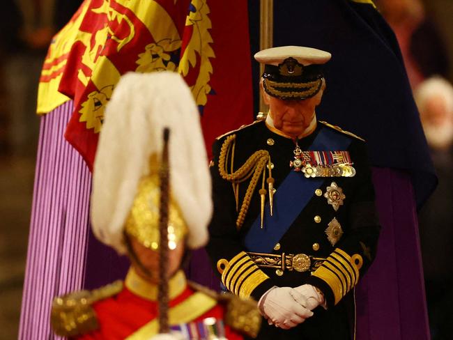 Britain's King Charles III stands guards as he takes part in a vigil around the coffin of Queen Elizabeth II. Picture: AFP.