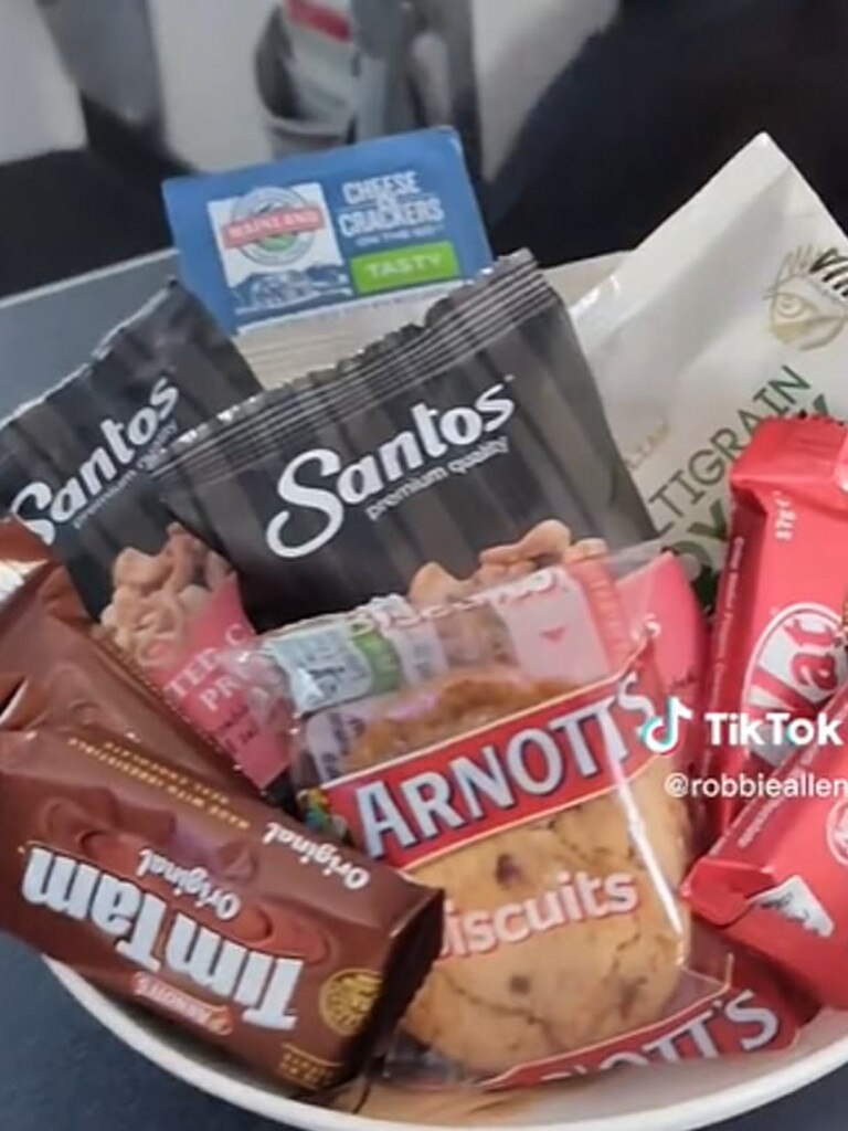 He was given snacks and wine. Picture: Tiktok/@robbieallen