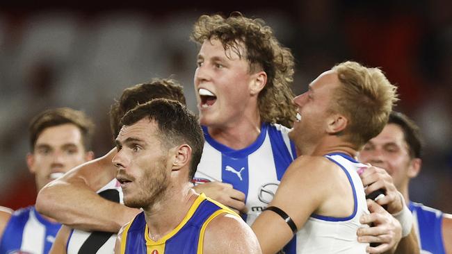 Nick Larkey of the Kangaroos celebrates kicking a goal during the round one AFL match between North Melbourne Kangaroos and West Coast Eagles at Marvel Stadium.