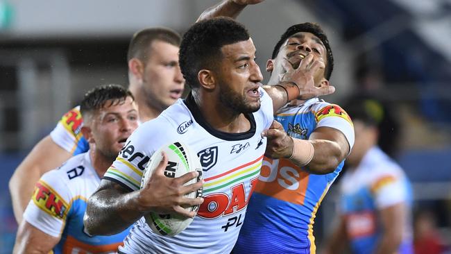 Viliame Kikau fends off Tyrone Peachy. Picture: AAP Image/Dave Hunt