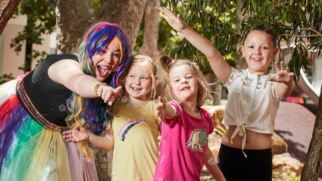 Lauren Grant as Rosie with Azaylea, 5, Jemaya, 4, and Maya, 7, ahead of the Southern Children’s Festival. Picture: AAP/Matt Loxton