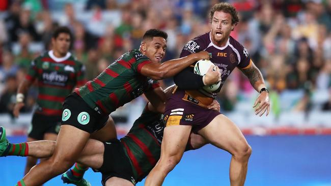 Korbin Sims can’t escape the tackle. (Matt King/Getty Images)