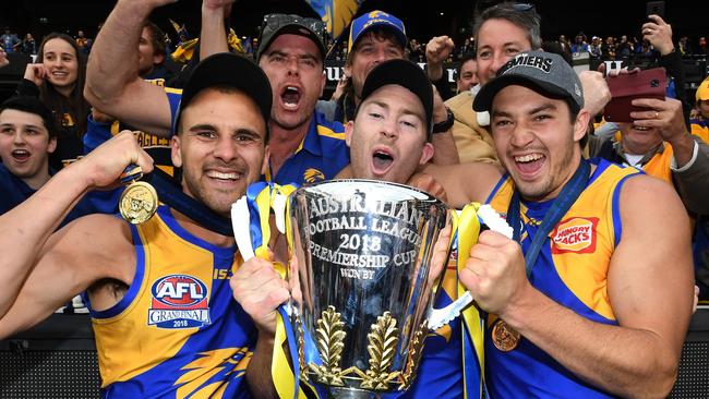 Eagles (left to right) Dom Sheed, Jeremy McGovern and Liam Duggan celebrate the side’s 2018 AFL premiership. Picture: AAP/Julian Smith