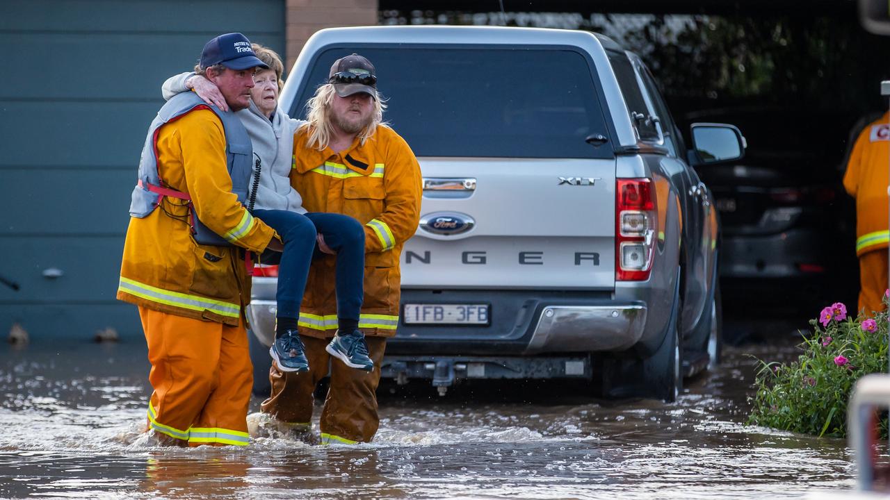 An elderly woman was rescued from her home after flood waters inundated the house in Rochester. Picture: Jason Edwards