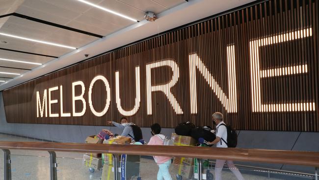 People travelling through Melbourne Airport on Wednesday have been asked to check for measles symptoms, after a returned traveller from Dubai tested positive to the disease. Picture: NewsWire / David Crosling