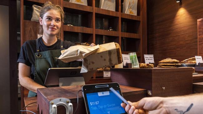 Some cafes say almost all of their payments have become cashless. Picture: Jake Nowakowski