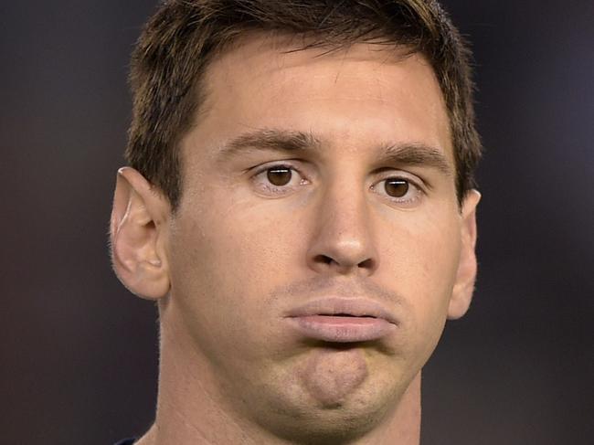 Argentina's forward Lionel Messi gestures before a friendly football match against Trinidad and Tobago at the Monumental stadium in Buenos Aires, Argentina on June 4, 2014 in preparation of the 2014 FIFA World Cup Brazil to be held between June 12 and July 13. Argentina won 3-0. AFP PHOTO / Juan Mabromata