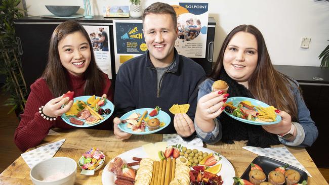 Workers from Solpoint - Ana Rivera, Conar Macleod and Madalene Taylor - are doing the Shout Lunch Day. Picture: Ellen Smith