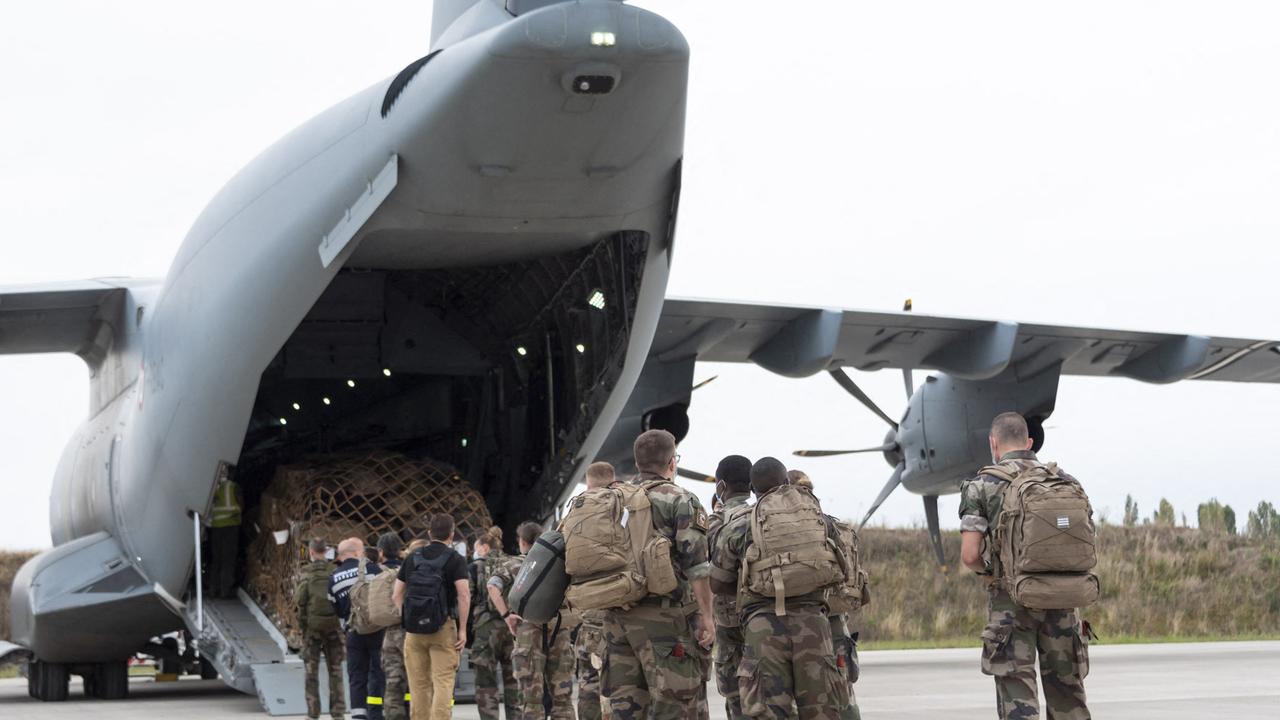 French soldiers board an A400M Atlas at the Bricy Air Base, a French Air and Space Force base near Orleans as part of operation Apagan. Picture: AFP