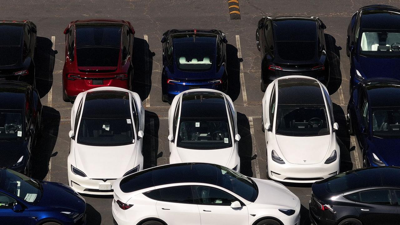 Brand new Tesla cars sit parked at a dealership in California. Picture: Justin Sullivan/Getty Images/AFP