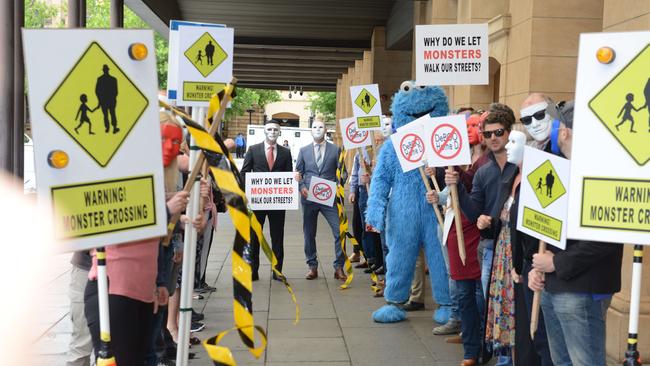 The “monster’s walk” created by the brothers and their supporters outside court last year.