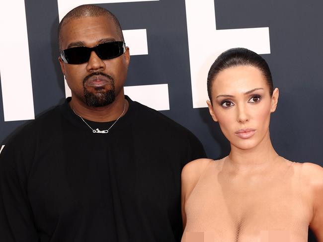 PIXELATED VERSIONS -  LOS ANGELES, CALIFORNIA - FEBRUARY 02: (EDITOR'S NOTE: Image contains nudity.) L-R, Kanye West and Bianca Censori attend the 67th Annual GRAMMY Awards on February 02, 2025 in Los Angeles, California.  (Photo by Matt Winkelmeyer/Getty Images for The Recording Academy)