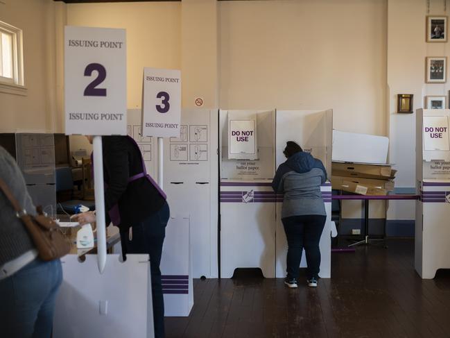 QUEANBEYAN, AUSTRALIA - JULY 04: Voters fill ballots in a voting centre on July 04, 2020 in Queanbeyan, Australia. The rural seat of Eden-Monaro is holding a by-election following the resignation of Labour MP Mike Kelly due to health issues. (Photo by Rohan Thomson/Getty Images)