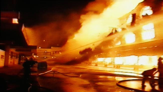 Retired fire fighter Athol Harding of Brassall recalls the night he fought the huge fire at Reids department store in the Ipswich CBD. Images taken from old video footage. Photo: Contributed CONDITIONS OF USE UNKNOWN / FEES MAY APPLY