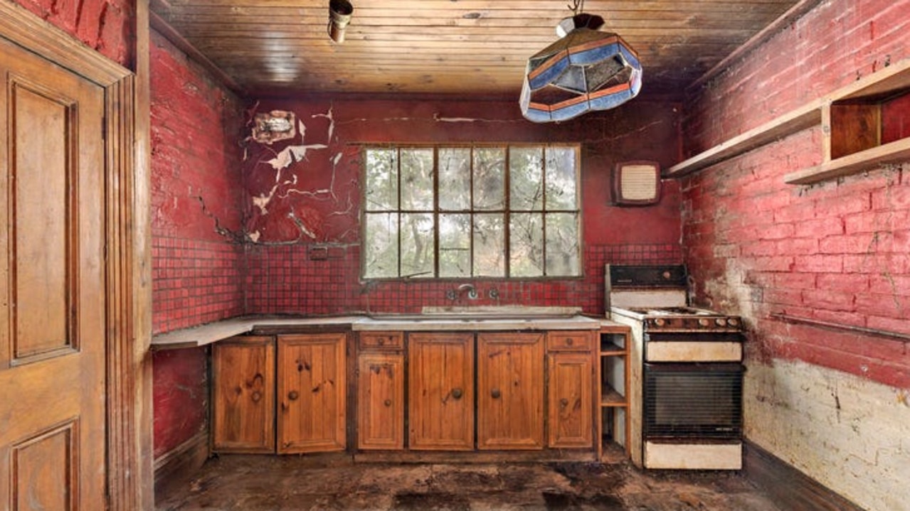 Crumbling home sells for $1.22m.