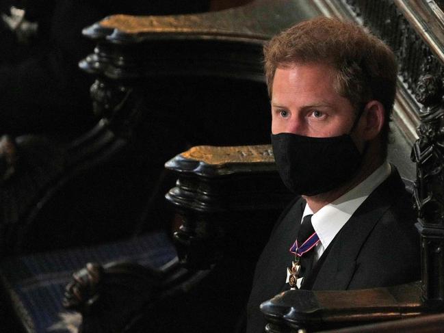 Prince Harry sits alone at the funeral. Picture: AFP